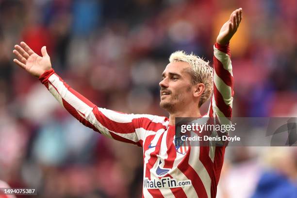 Antoine Griezmann of Atletico Madrid celebrates after the final whistle of the LaLiga Santander match between Atletico de Madrid and Real Sociedad at...