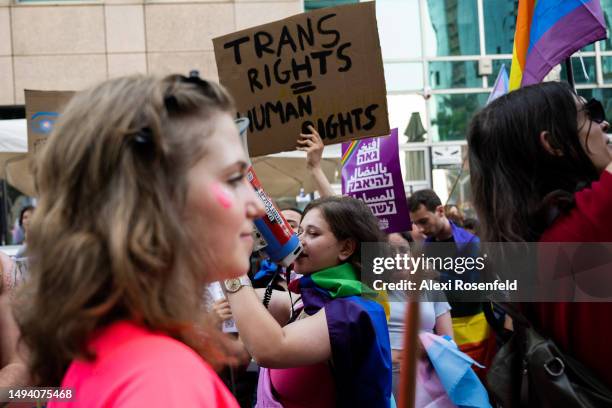 People protest outside a lecture by author Abigail Shrier about ‘protecting children from Trans fashion’ on May 28, 2023 in Ramat Gan, Israel. Shrier...