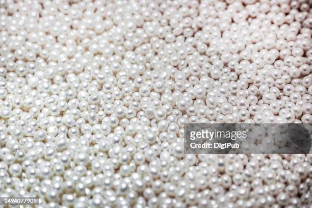 pearl-like plastic beads - white bead stock pictures, royalty-free photos & images