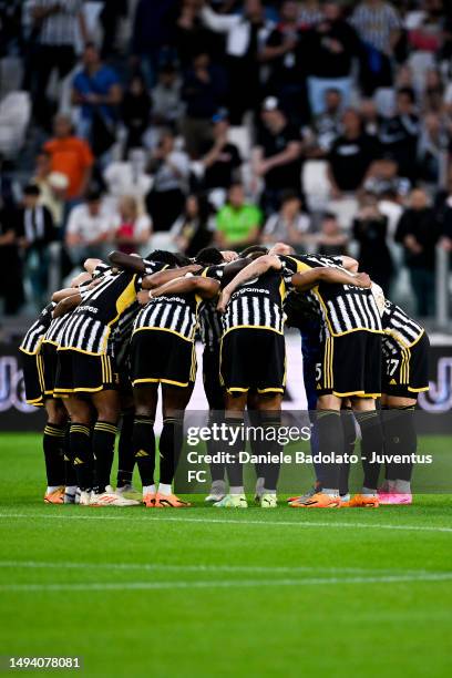 Juventus players encourage one and another prior to kick off of the Serie A match between Juventus and AC MIlan at Allianz Stadium on May 28, 2023 in...