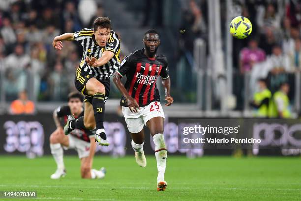 Federico Chiesa of Juventus is challenged by Fikayo Tomori of AC Milan during the Serie A match between Juventus and AC MIlan at Allianz Stadium on...