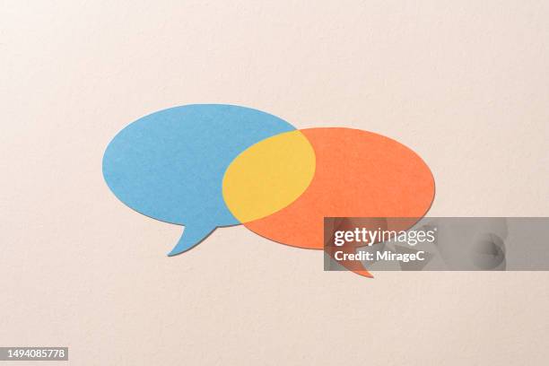 overlapped chat bubbles reach a consensus, paper craft - reconciliation stock pictures, royalty-free photos & images