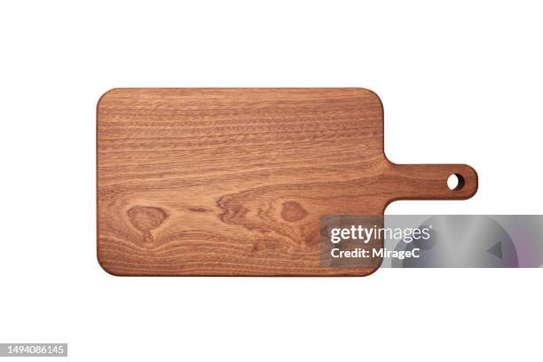 brown wooden cutting board with handle isolated on white - cutting board stockfoto's en -beelden