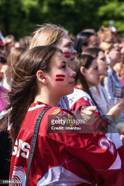 esplanade square in riga during the ice hockey championship - girls ice hockey stock pictures, royalty-free photos & images