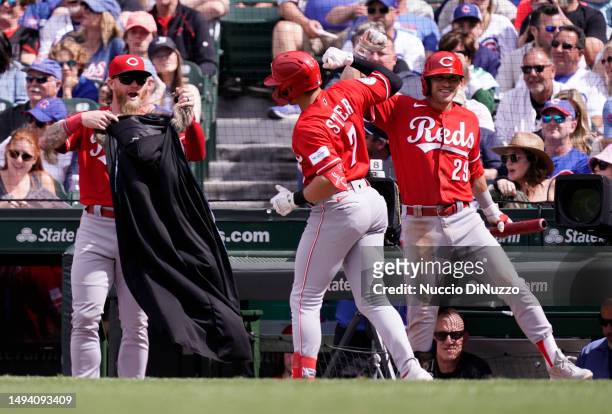 Spencer Steer of the Cincinnati Reds is congratulated by teammate TJ Friedl following a two-run home run during the sixth inning of a game against...