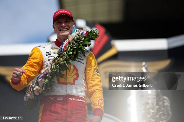 Josef Newgarden, driver of the PPG Team Penske Chevrolet, celebrates in victory lane after winning the 107th Running of Indianapolis 500 at...