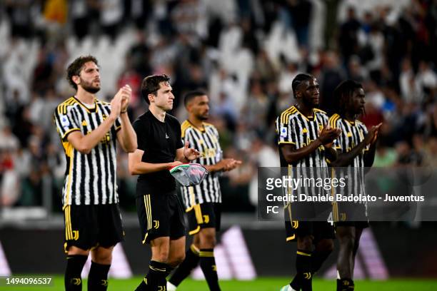 Federico Chiesa and Samuel Iling of Juventus greet the fans after the Serie A match between Juventus and AC Milan at Allianz Stadium on May 28, 2023...