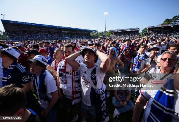 Hamburger SV fans look dejected after their side finished 3rd in the league, and will have to play a further play off game after the Second...