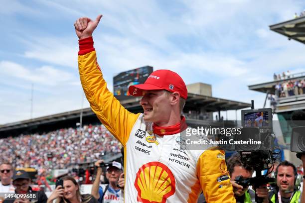 Josef Newgarden, driver of the PPG Team Penske Chevrolet, celebrates after winning The 107th Running of the Indianapolis 500 at Indianapolis Motor...
