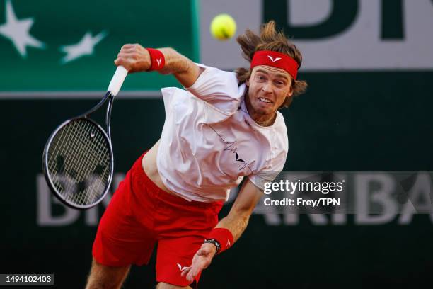 Andrey Rublev of Russia serves against Laslo Djere of Serbia in the first round of the men's singles at Roland Garros on May 28, 2023 in Paris,...