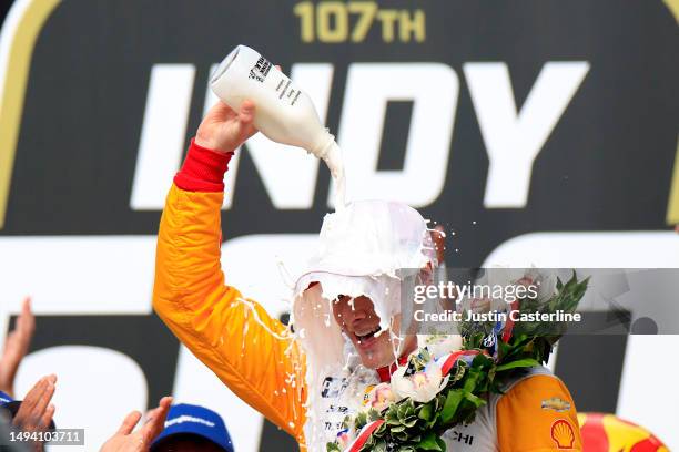 Josef Newgarden, driver of the PPG Team Penske Chevrolet, celebrates after winning The 107th Running of the Indianapolis 500 at Indianapolis Motor...