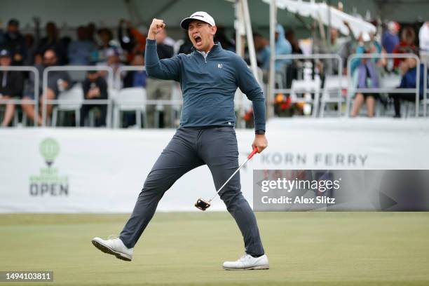 Rico Hoey of the United States celebrates after sinking a birdie putt on the 18th hole during the final round of the Visit Knoxville Open at Holston...