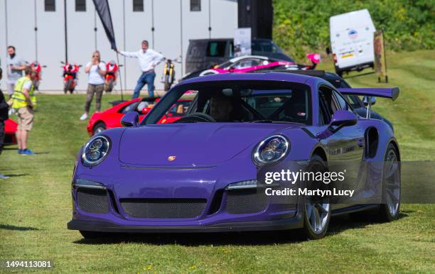 The Porsche 911 GT3RS seen at Petrolheadonism Cars and Copters Event in Bedfordshire. Every year, Petrolheadonism host a cars and copters event to...