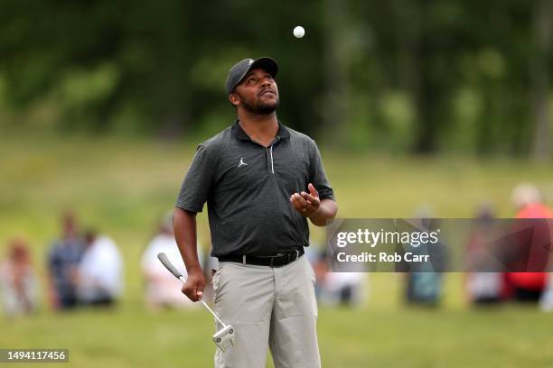 Harold Varner III of RangeGoats GC throws his ball in the air after putting out on the second hole during the third round of the LIV Golf...