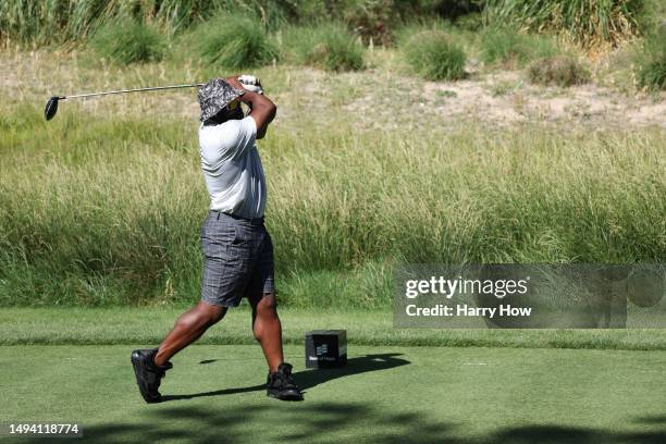 Football running back Mark Ingram II hits a tee shot on the 15th hole on day five of the Bank of Hope LPGA Match-Play presented by MGM Rewards at...