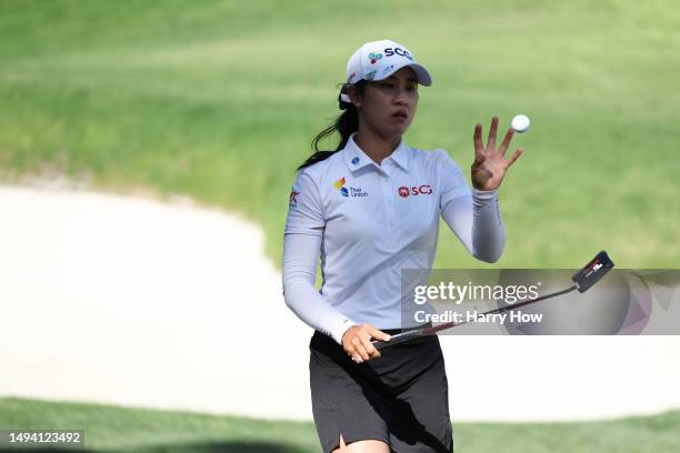 Pajaree Anannarukarn of Thailand reacts to a putt on the ninth hole on day five of the Bank of Hope LPGA Match-Play presented by MGM Rewards at...