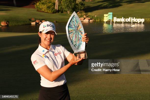 Pajaree Anannarukarn of Thailand poses for a photo with the winner's trophy after winning on day five of the Bank of Hope LPGA Match-Play presented...