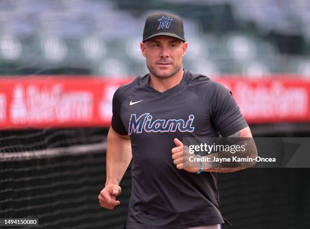 Skip Schumaker manager of the Miami Marlins walks on the field prior to the game against the Los Angeles Angels at Angel Stadium of Anaheim on May...