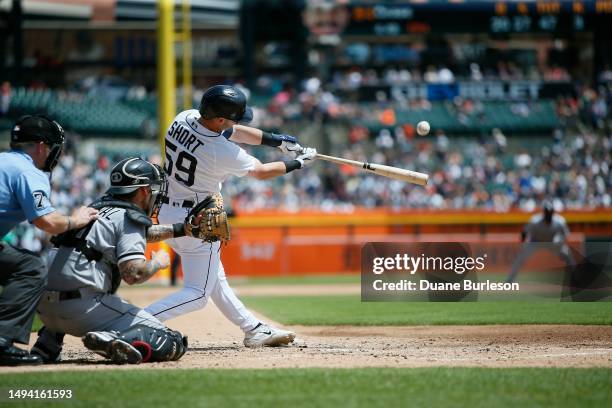 Zack Short of the Detroit Tigers hits a fly ball against the Chicago White Sox at Comerica Park on May 28, 2023 in Detroit, Michigan.