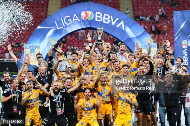 Guido Pizarro of Tigres lifts the champions trophy after the final second leg match between Chivas and Tigres UANL as part of the Torneo Clausura...