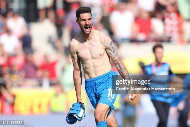 Tim Kleindienst of 1. FC Heidenheim 1846 celebrates after the team's victory and promotion to the Bundesliga in the Second Bundesliga match between...