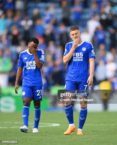 Harvey Barnes and Ricardo Pereira of Leicester look dejected after being relegated after the Premier League match between Leicester City and West Ham...