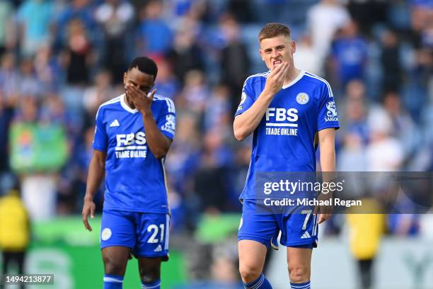 Harvey Barnes and Ricardo Pereira of Leicester look dejected after being relegated after the Premier League match between Leicester City and West Ham...