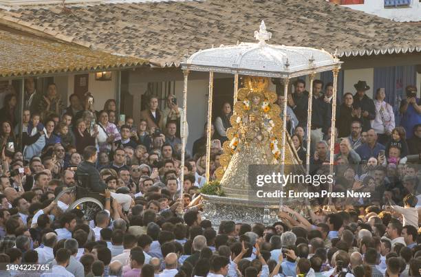 The Virgin of El Rocio processions through the streets of the village, May 29 in El Rocio . The Virgin of El Rocio leaves her Hermitage after the...