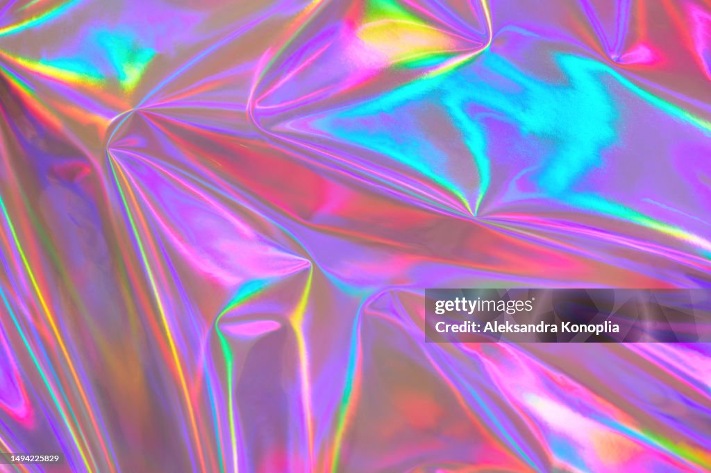 Abstract surreal pastel neon purple, pink, blue metallic dreamy optimistic kawaii holographic foil texture. 80s, 90s, 2000s retro style, Futuristic,Dream Punk, Dreamcore, Retro-Futurism, 80s, 90s, y2k, holosexual background.