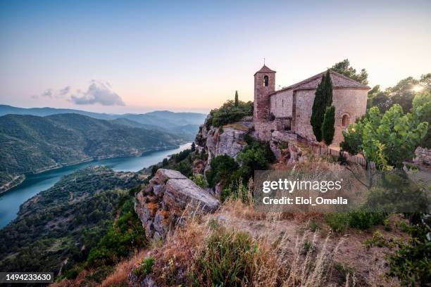 church of santa maria de siurana in catalonia at sunset, spain, costa dorada - tarragona stock pictures, royalty-free photos & images