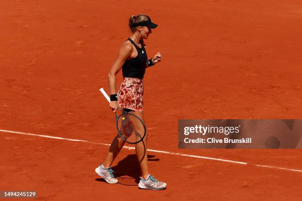 Kristina Mladenovic of France celebrates a point against Karla Day of United States during their Women's Singles First Round Match on Day Two of the...