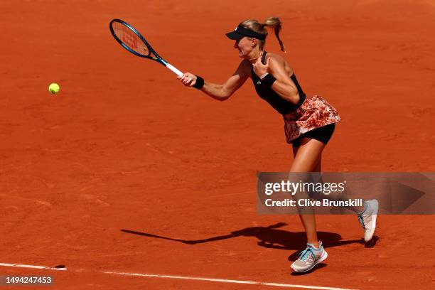 Kristina Mladenovic of France plays a forehand against Karla Day of United States during their Women's Singles First Round Match on Day Two of the...