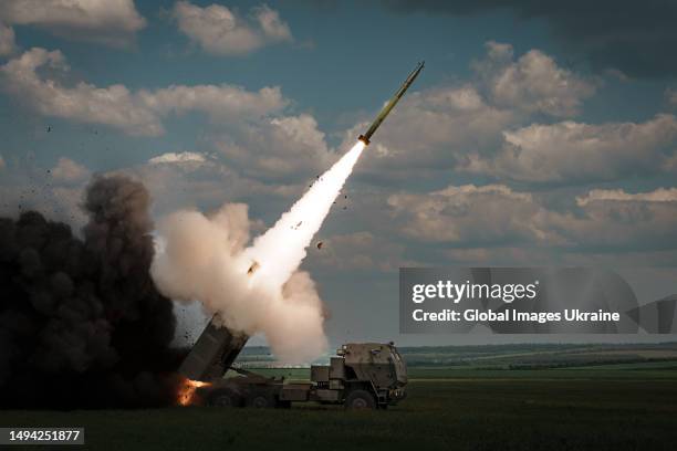 Launches a rocket on the Bakhmut direction on May 18, 2023 in Donetsk Oblast, Ukraine. Ukraine received the HIMARS as part of international military...