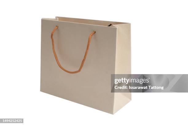 folded paper bag with handle isolated on white background - sack ストックフォトと画像