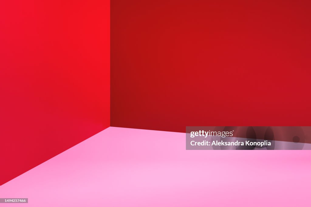Minimal empty red pink 3d room background. Modern Studio showcase with copy space. Trendy place to advertise your products. Luxury stage concept for cosmetic, beauty, fashion, product mock-up design template presentation