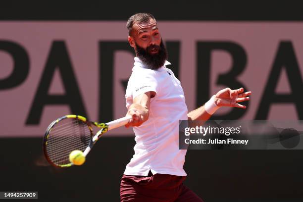 Benoit Paire of France plays a forehand against Cameron Norrie of Great Britain during their Men's Singles First Round Match on Day Two of the 2023...