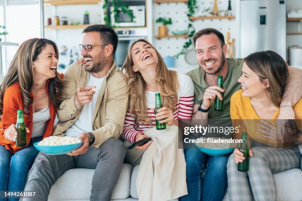 friends watching tv - championship final round stock pictures, royalty-free photos & images