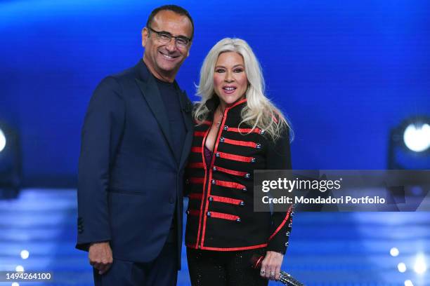 The italian conductor Carlo Conti and British singer Samantha Fox during the broadcast The best years. Rome , May 28th, 2023