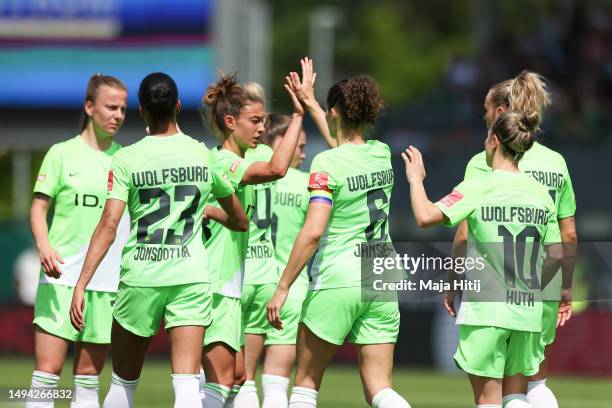Dominique Janssen of VfL Wolfsburg celebrates after scoring their sides second goal from the penalty spot during the FLYERALARM Frauen-Bundesliga...