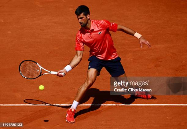 Novak Djokovic of Serbia plays a forehand against Aleksandar Kovacevic of United States during their Men's Singles First Round Match on Day Two of...