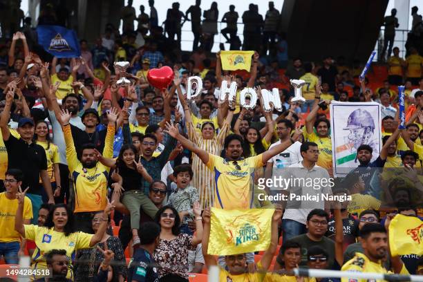 Spectators show their support before the 2023 IPL Final match between Chennai Super Kings and Gujarat Titans at Narendra Modi Stadium on May 29, 2023...