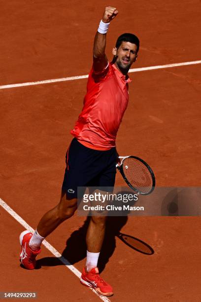 Novak Djokovic of Serbia celebrates a point against Aleksandar Kovacevic of United States during their Men's Singles First Round Match on Day Two of...