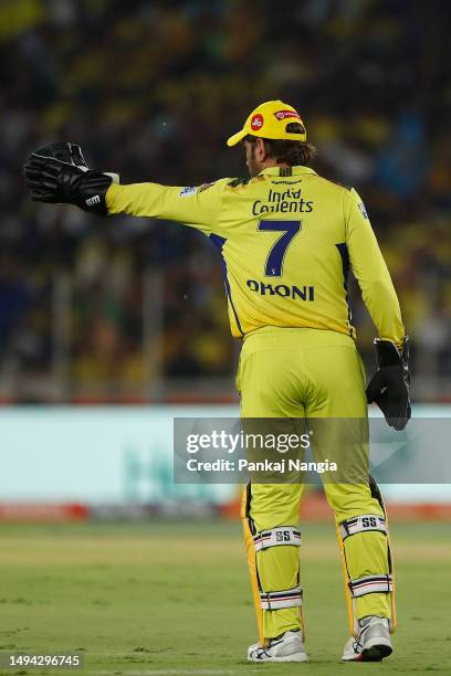 Dhoni of the Chennai Super Kings sets his field during the 2023 IPL Final match between Chennai Super Kings and Gujarat Titans at Narendra Modi...