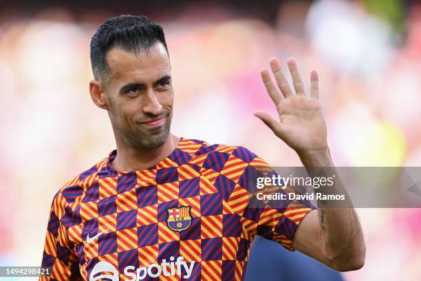 Sergio Busquets of FC Barcelona waves to fans prior to the LaLiga Santander match between FC Barcelona and RCD Mallorca at Spotify Camp Nou on May...
