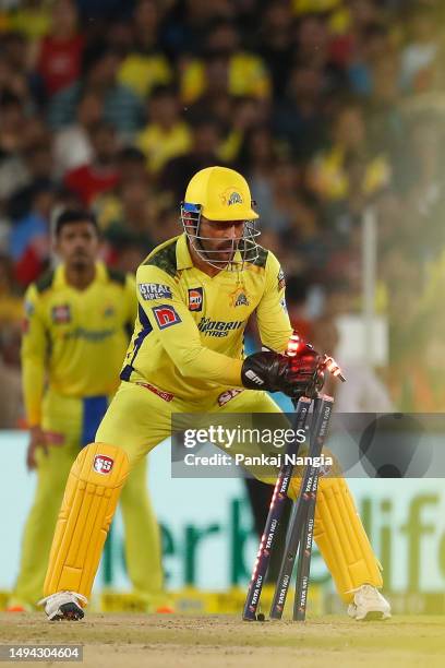 Dhoni of the Chennai Super Kings stumps Shubman Gill of the Gujarat Titans during the 2023 IPL Final match between Chennai Super Kings and Gujarat...