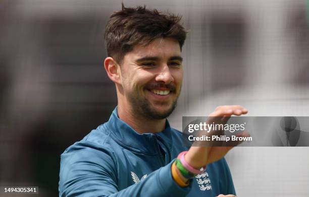 Josh Tongue of England smiles during a training session before Thursday's Test match between England and Ireland at Lord's Cricket Ground on May 29,...