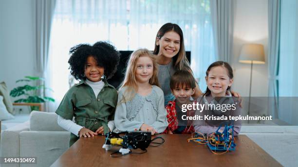 teachers play a core part in children development process through education. - robot teacher stock pictures, royalty-free photos & images