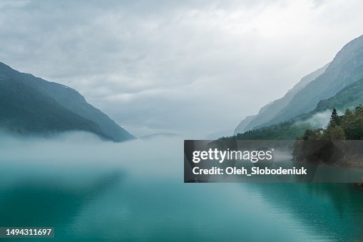 Scenic view of lake in Norway covered in fog