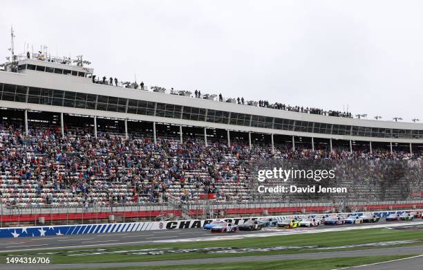 Justin Allgaier, driver of the Unilever Military DeCA RCPT Chevrolet, leads the field to the green flag to start the NASCAR Xfinity Series Alsco...