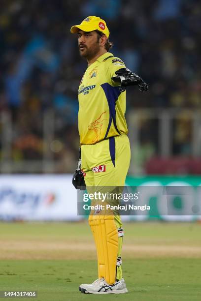 Dhoni of the Chennai Super Kings sets the field during the 2023 IPL Final match between Chennai Super Kings and Gujarat Titans at Narendra Modi...